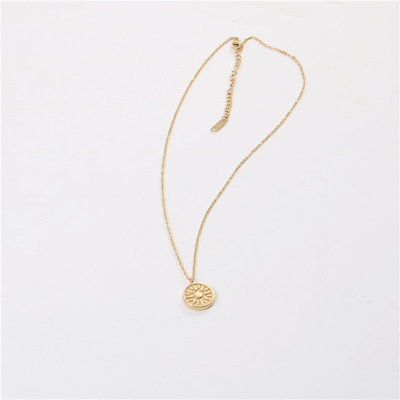 Gold Sunburst Coin Pendant Necklace