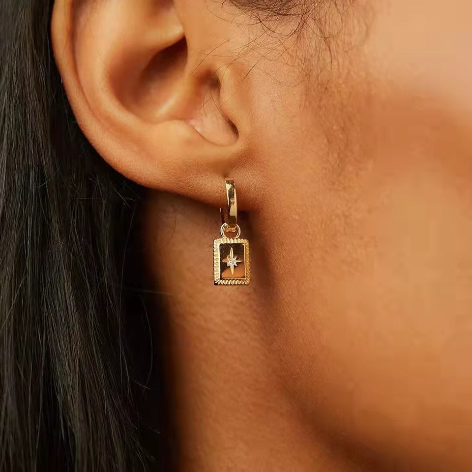 Gold Star Medallion Huggie Earrings
